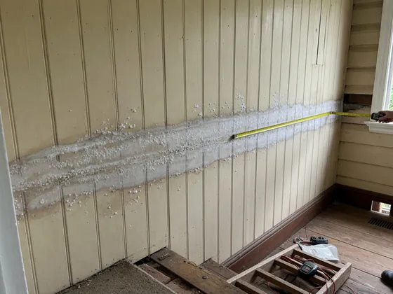 Confirming the tide-mark height — what a rising damp inspection looks like, Brisbane Queenslander
